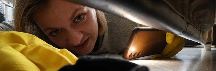 woman cleaning rat urine
